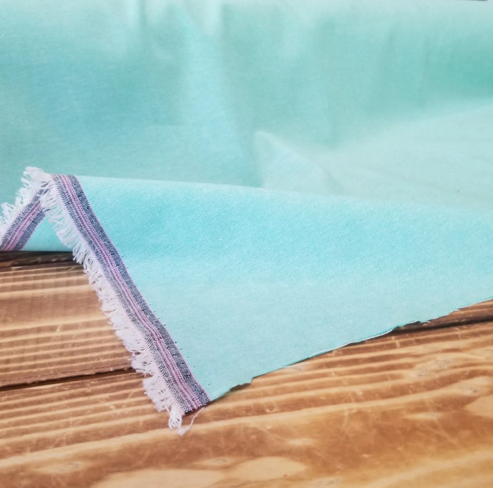 End of BOlt: 3.5 yards of Designer Deadstock Aquamarine Green Cotton Chambray Woven with Pink Selvedge -remnant